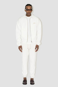 FLANEUR HOMME EMBROIDERED SIGNATURE SWEATPANTS IN ECRU